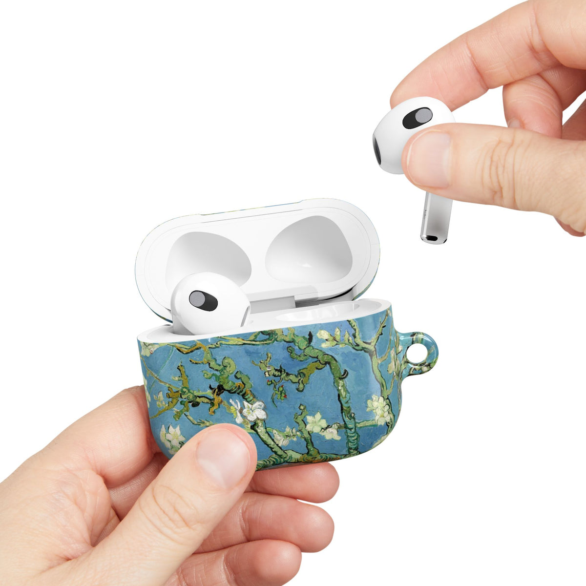 Almond Blossom AirPods case held in hand