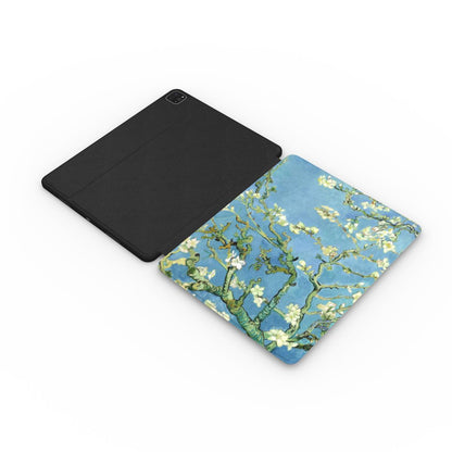 Almond Blossom iPad case open, showing the printed front and black back