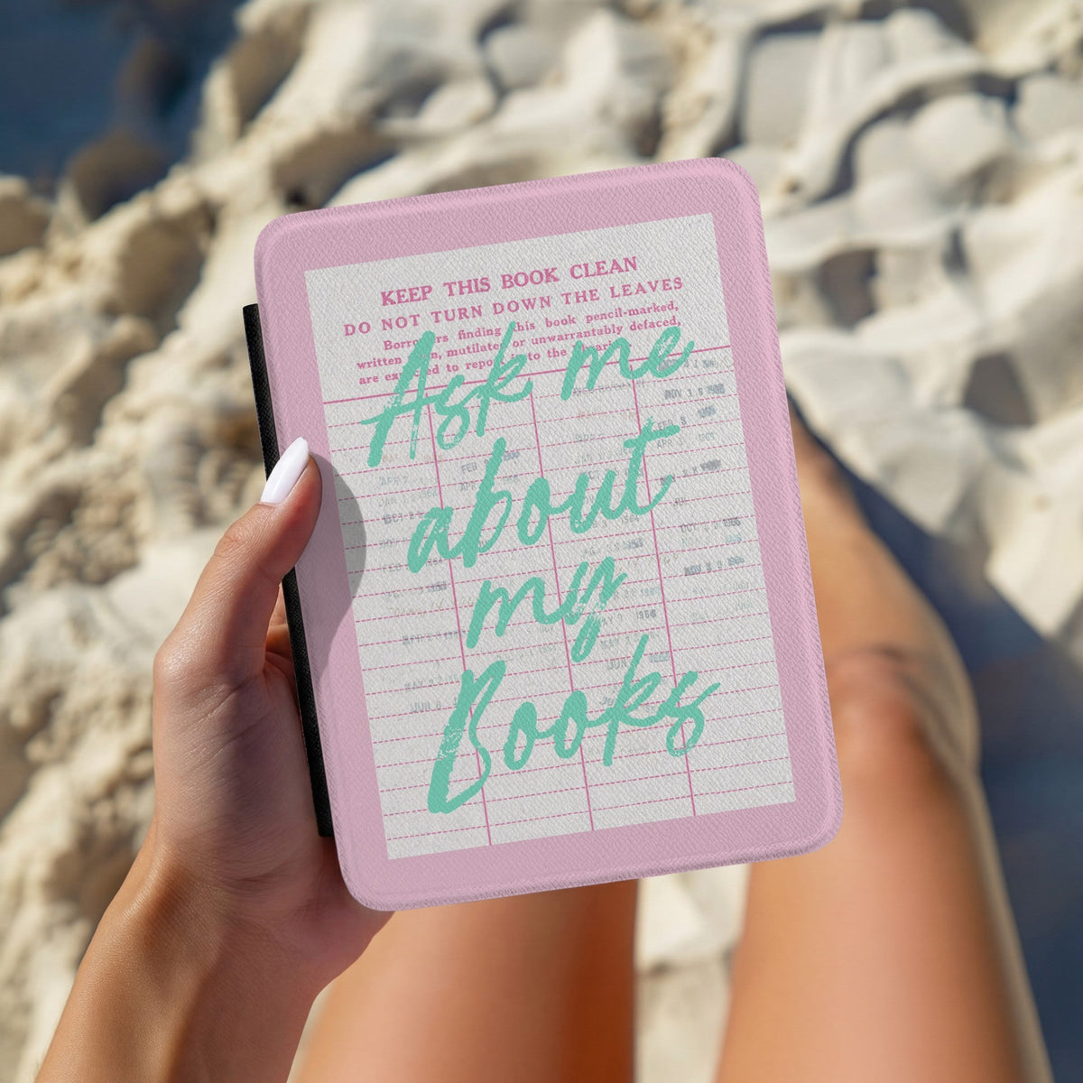 Ask Me About My Books Kindle case held open at the beach