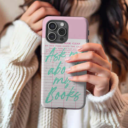 Ask Me About My Books tough phone case held in hand