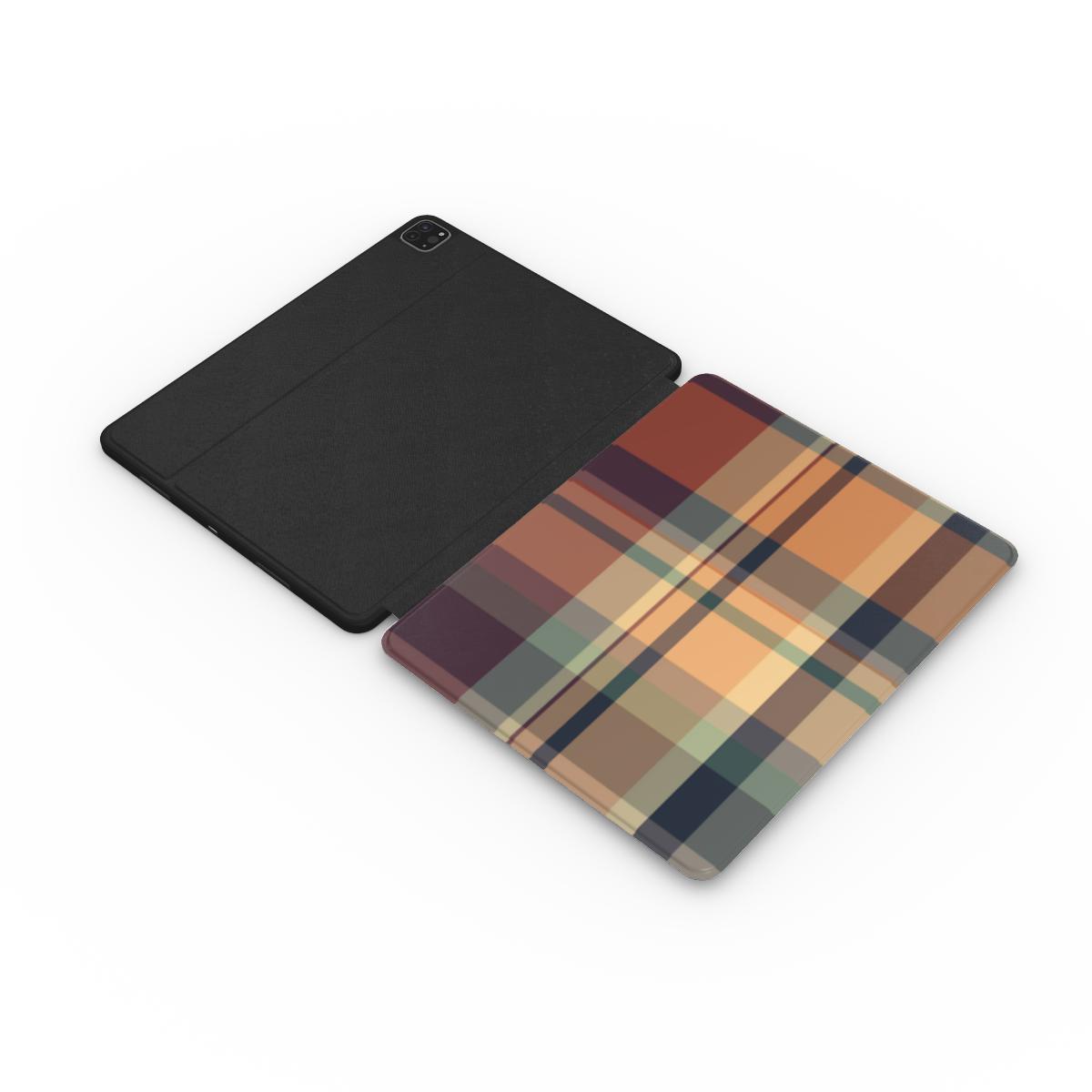 Autumn Plaid iPad case opened flat showing the printed front and black inside