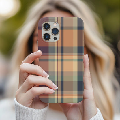 Autumn Plaid tough phone case held up in front of the face