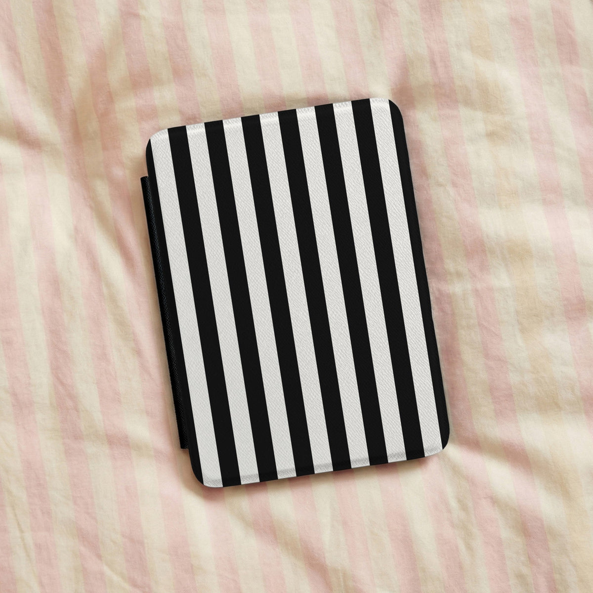 Black Cabana Stripe Kindle case on pink bed linen