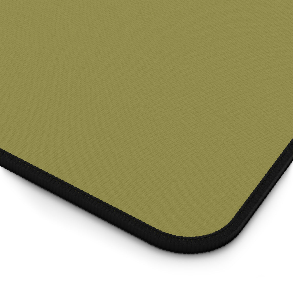 Close-up of the Bob Cut Frog desk mat stitched edge
