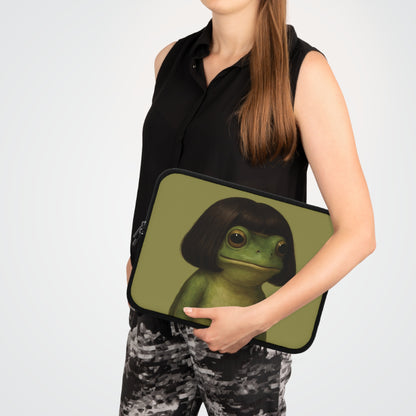 Bob Cut Frog laptop sleeve carried under the arm