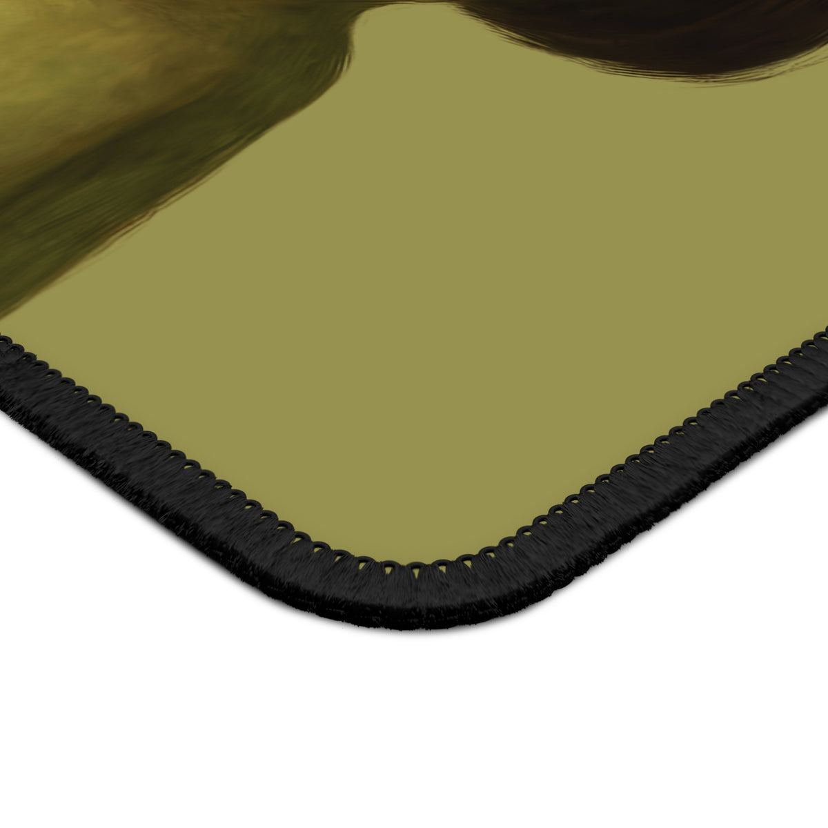 Close-up of the Bob Cut Frog mouse mat print and stitched edge