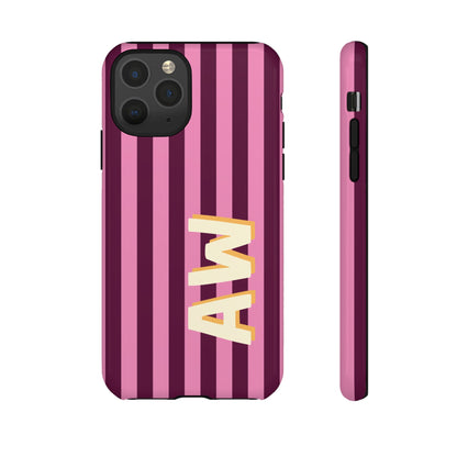 Striped monogram phone case in bubblegum pink and deep plum