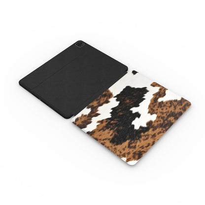 Brown Cow Print iPad case opened flat showing the printed front and black inside