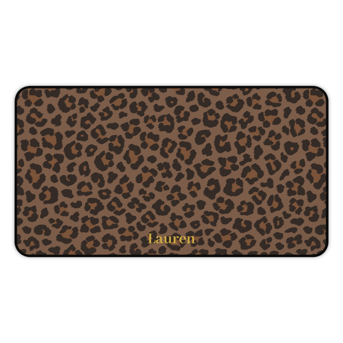 Brown leopard print desk mat laid flat with a name in gold script