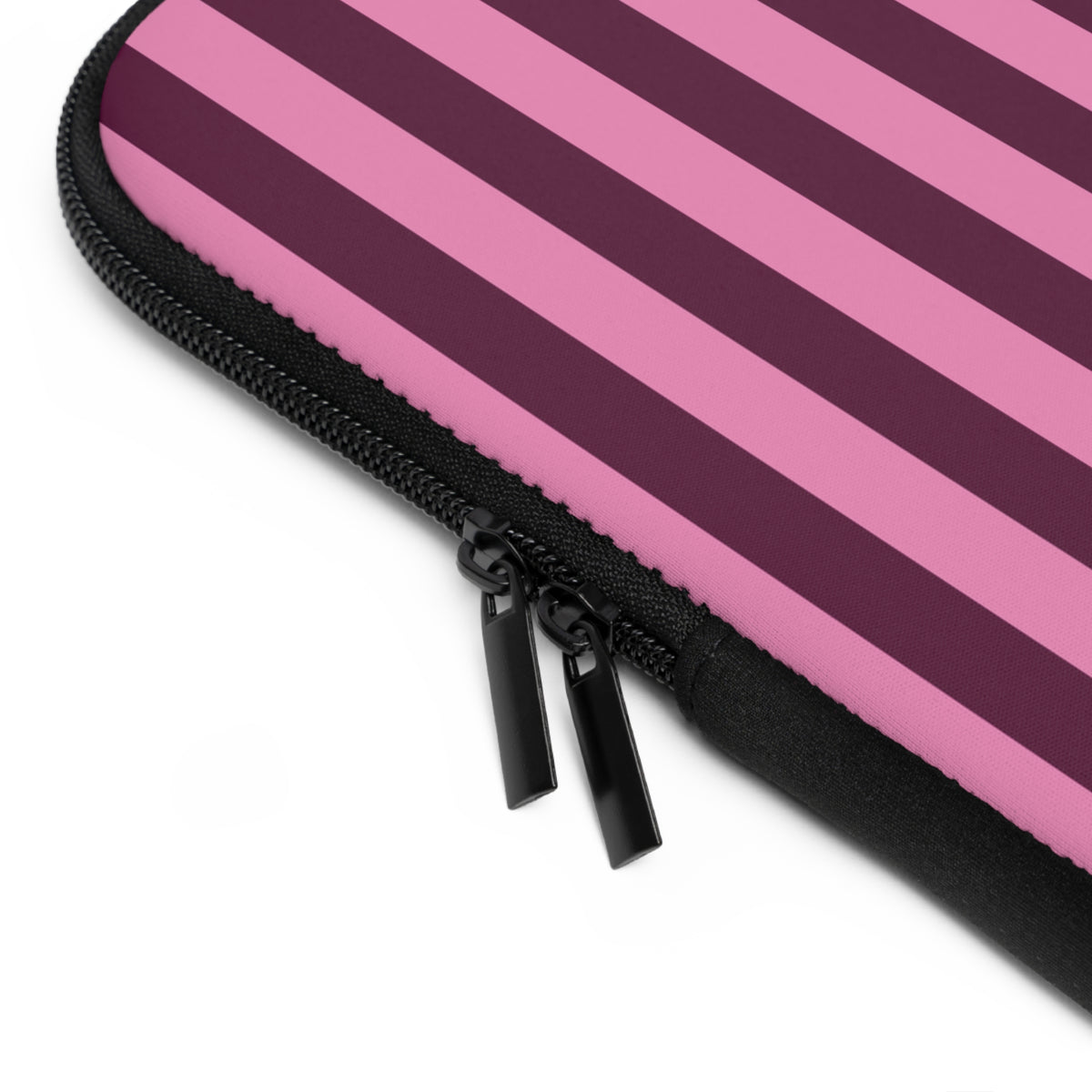 Close-up of the zipper and edge of the Burgundy Pink Cabana Stripe laptop sleeve