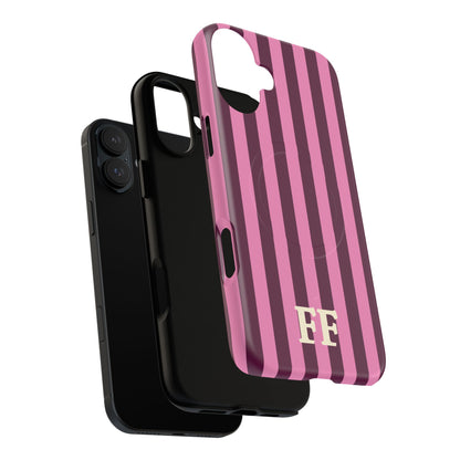 Burgundy Pink Cabana Stripe MagSafe phone case shown next to the phone