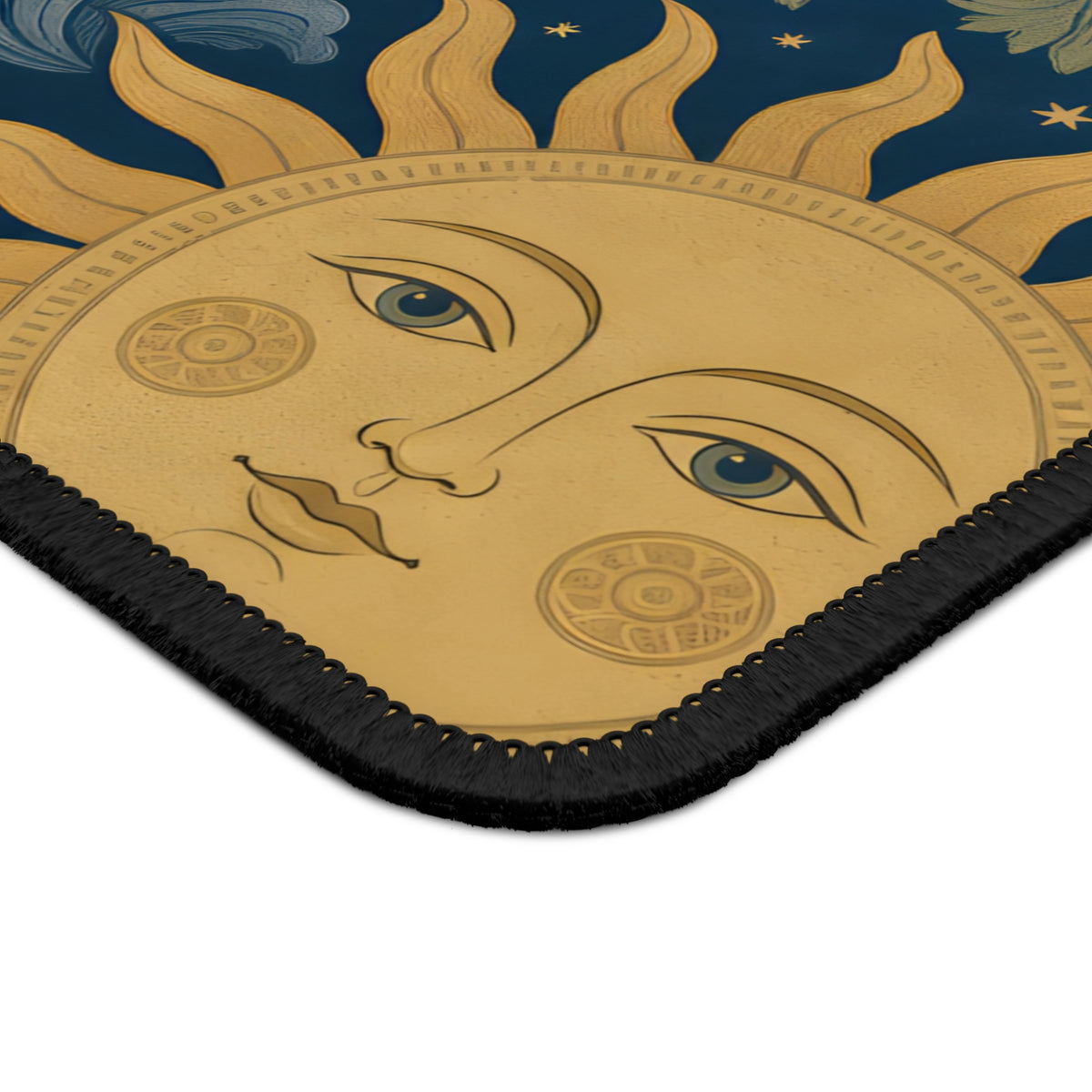 Close-up of the sun face and stitched edge of the Celestial Garden mouse mat