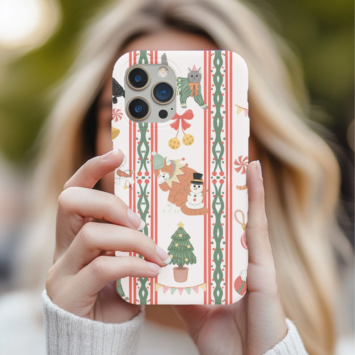 Christmas Cat tough phone case held up for a selfie