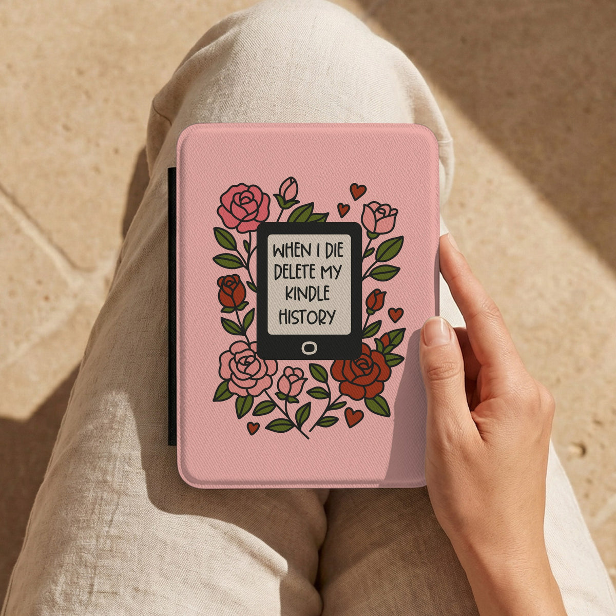 Delete My Kindle History Kindle case held on a lap while reading