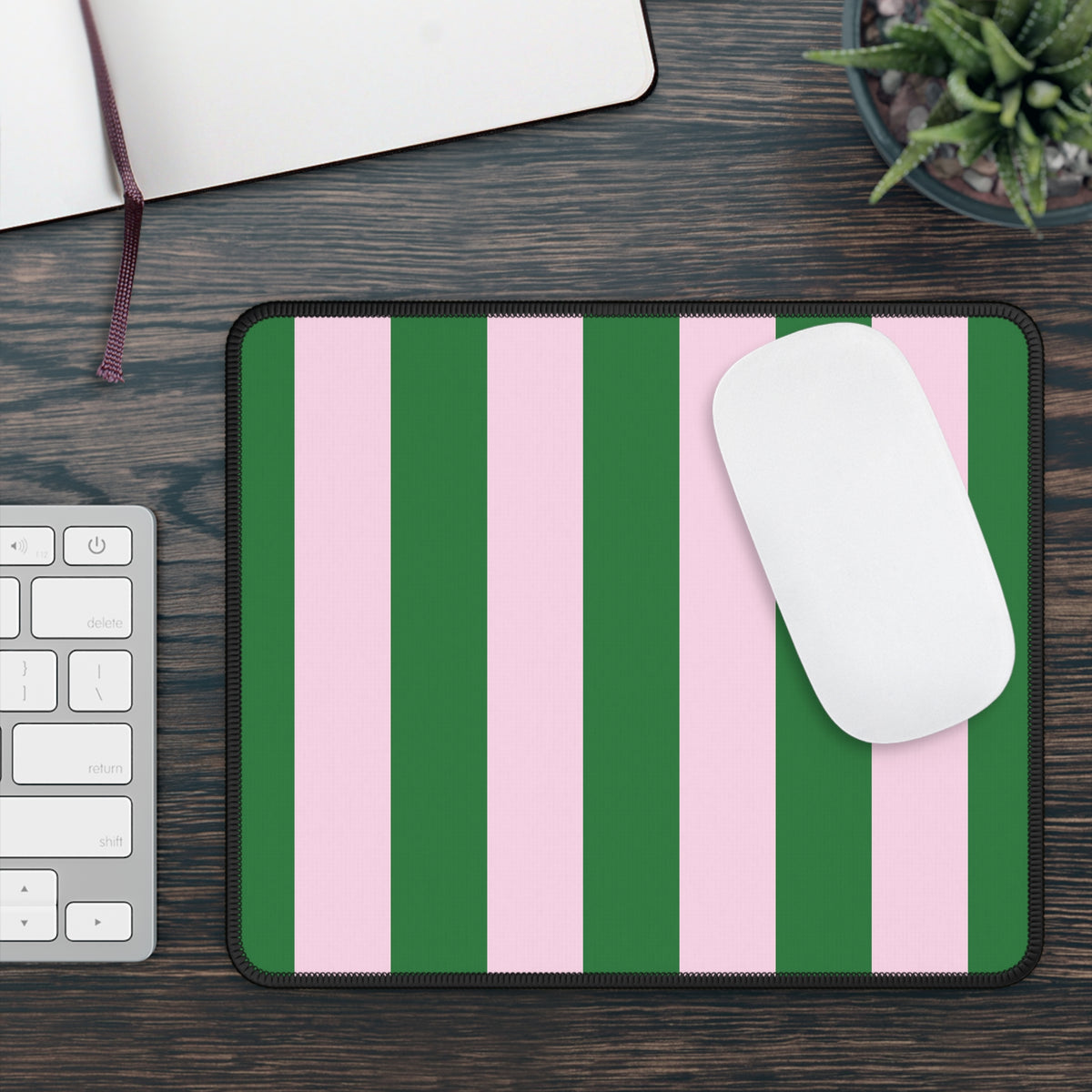 Green Cabana Stripe mouse mat on a wooden desk with a white mouse