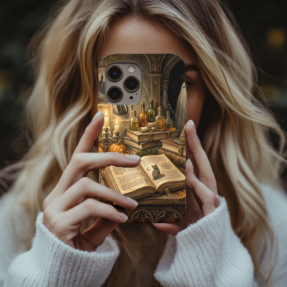 Haunted Library tough phone case held up in a mirror selfie