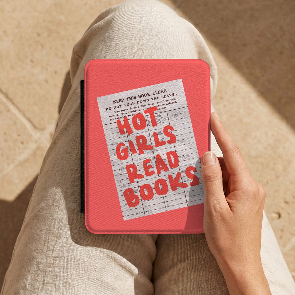 Hot Girls Read Books Kindle case held on the lap while reading