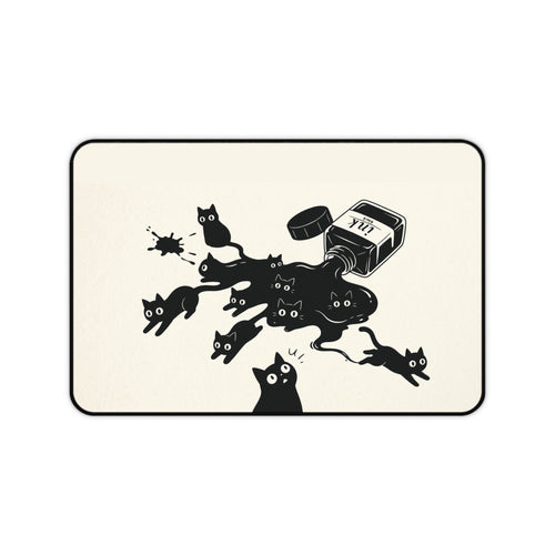 Ink Spill Cats desk mat laid flat showing black cats running from a tipped ink pot