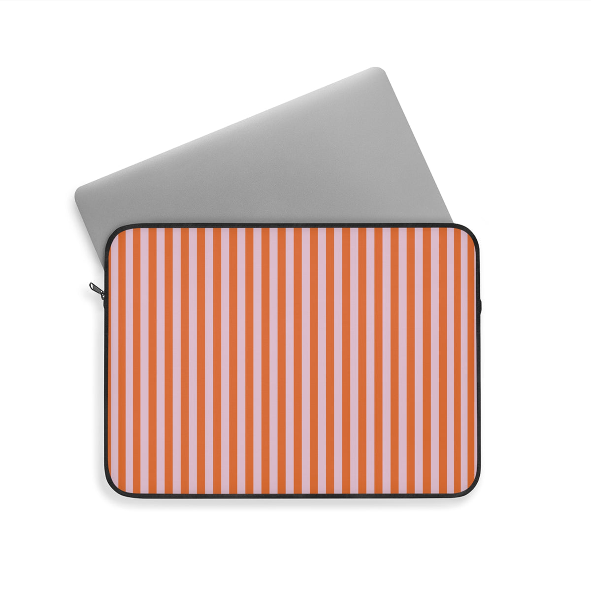 Pink and orange striped laptop sleeve with a laptop sliding out
