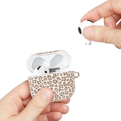 Leopard print AirPods case held in a hand