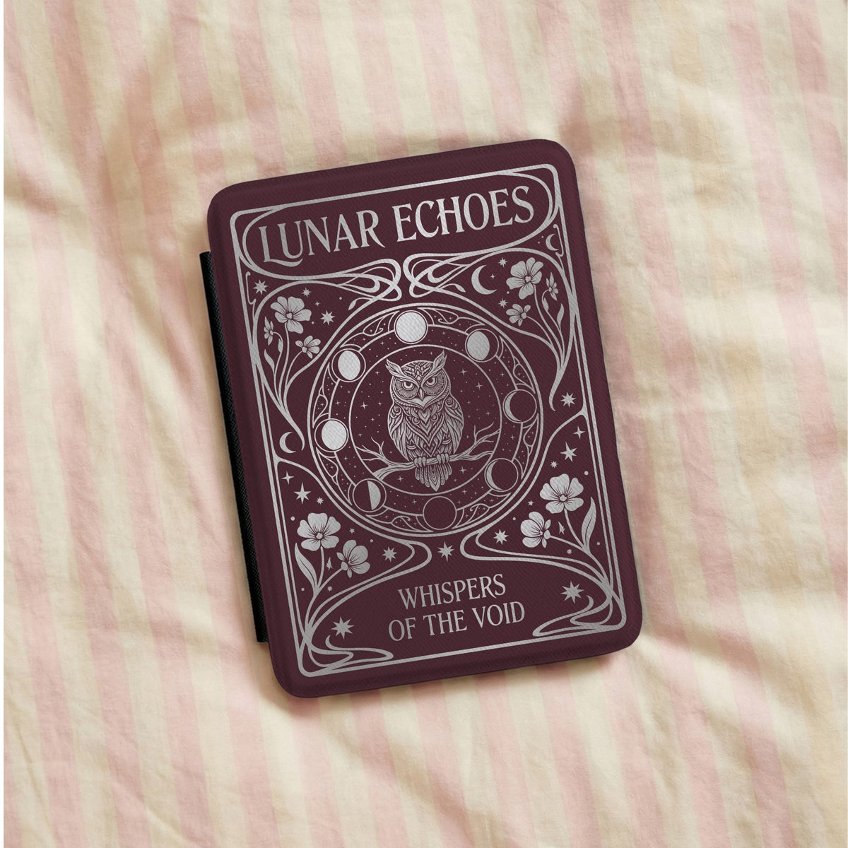 Lunar Echoes Kindle case on striped bedding