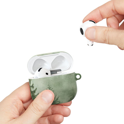 Misty Pine Forest AirPods case held in hand with an AirPod