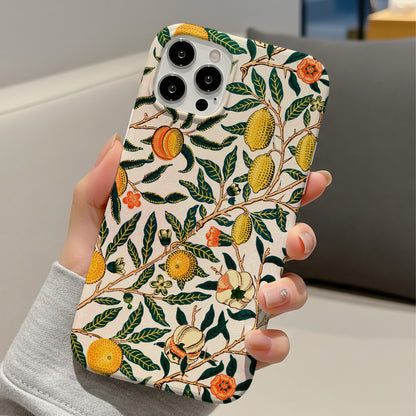 Morris Fruit tough phone case held in hand at a desk