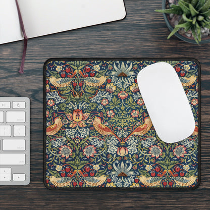Morris Strawberry Thief mouse mat beside a keyboard with a white mouse