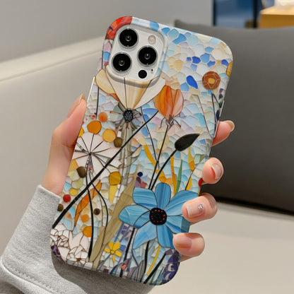 Hand holding a slim Mosaic Meadow floral phone case