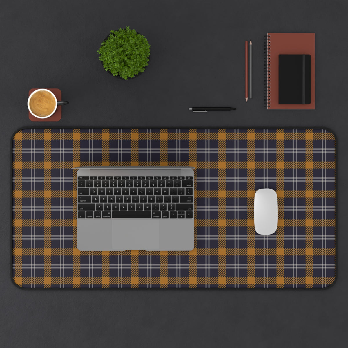 Extra large navy ochre plaid desk mat under a laptop and mouse