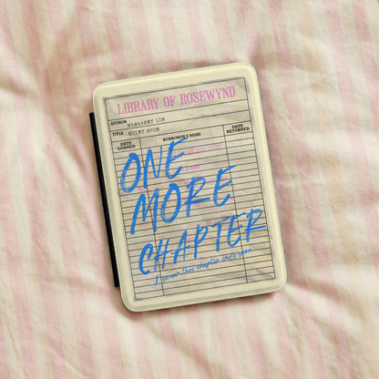 One More Chapter Kindle case lying on pink striped bedding