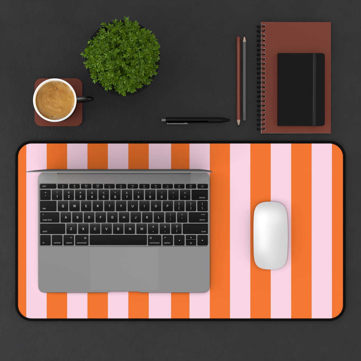 Orange Cabana Stripe desk mat 12 x 22 inch under a laptop and mouse