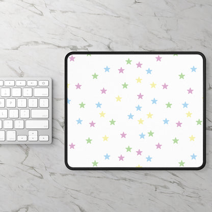 Pastel Stars mouse mat on a marble desk beside a keyboard