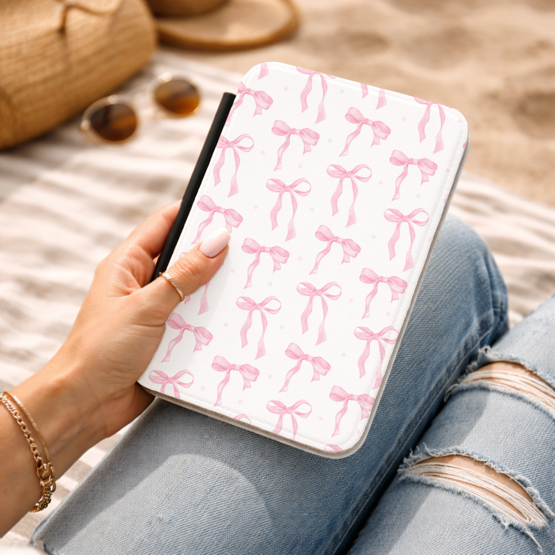 Pink bow and dot pattern in blush and white on a Kindle cover