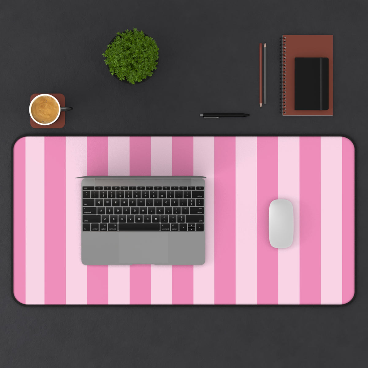Pink cabana stripe desk mat in the largest size on a styled desk
