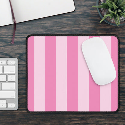 Pink cabana stripe mouse mat on a wooden desk beside a keyboard and mouse