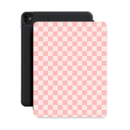 Pink checkerboard iPad case shown with an iPad