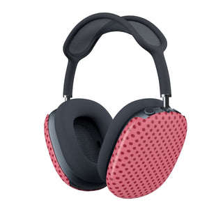Pink polka dot AirPods Max case on a pair of AirPods Max headphones