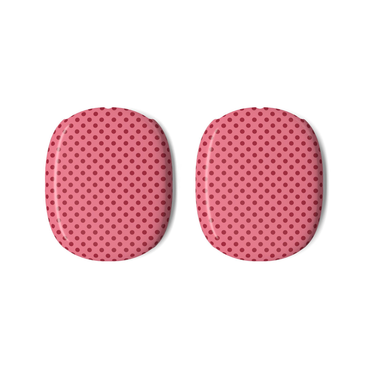 The two pink polka dot AirPods Max ear cup shells shown on their own