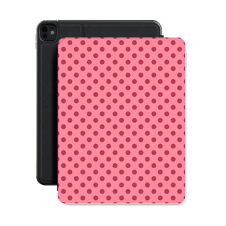 Pink polka dot iPad case shown with an iPad