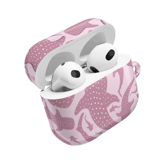 Pink whale shark AirPods case open with earbuds inside