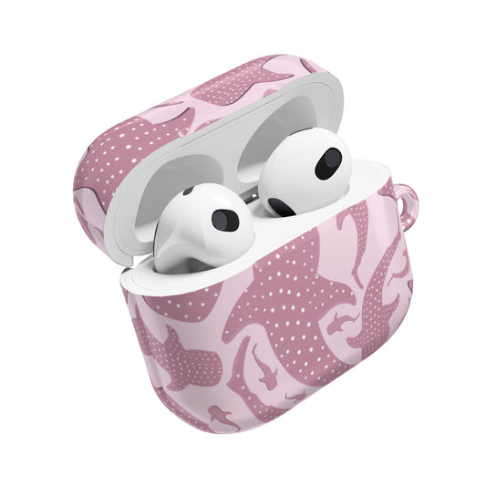 Pink whale shark AirPods case open with earbuds inside