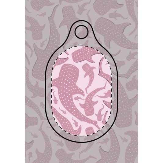 Pink whale shark AirTag case in dusty rose and blush, spotted shark silhouettes across the shell
