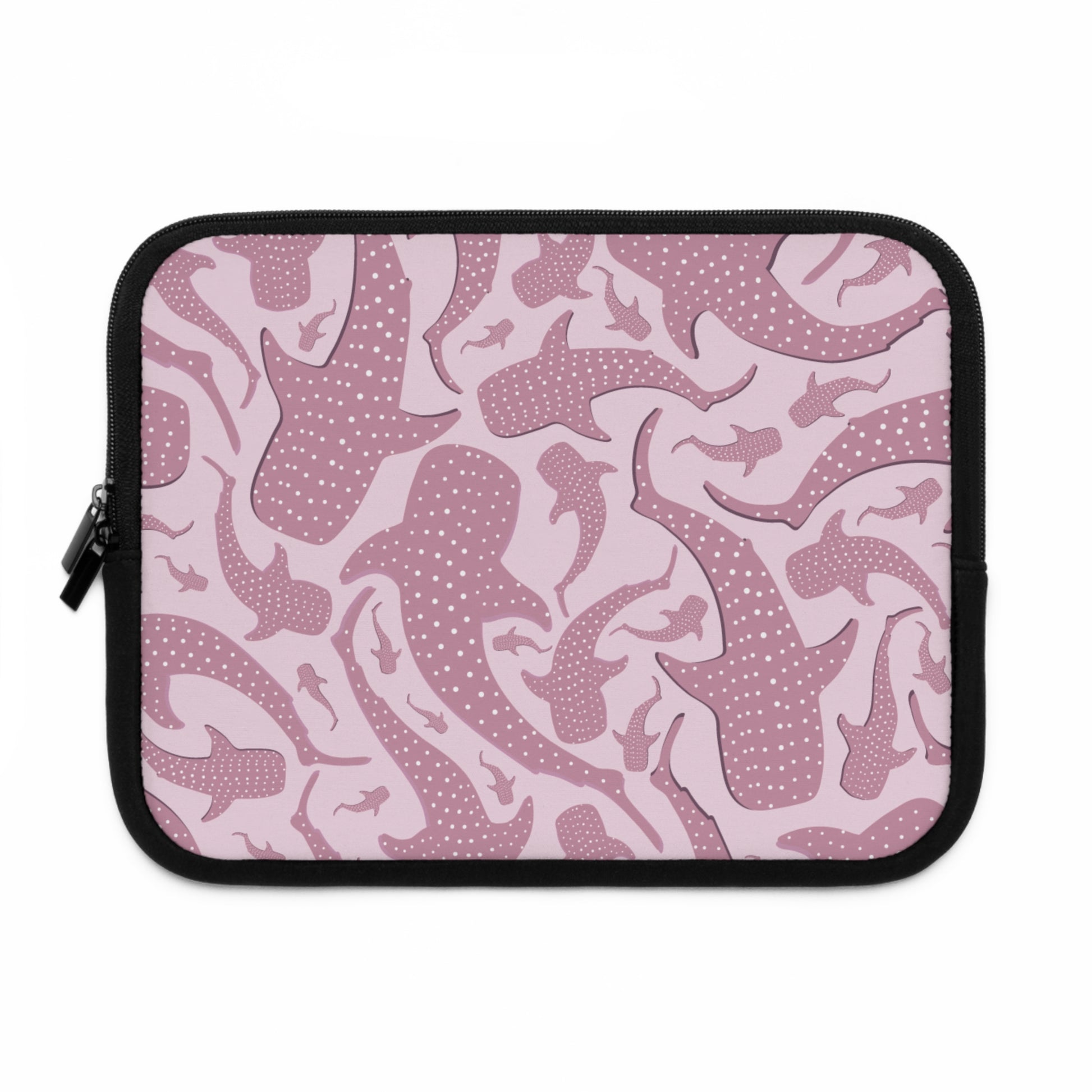 Pattern detail of the whale shark print, white dots speckled across rose-pink shark silhouettes