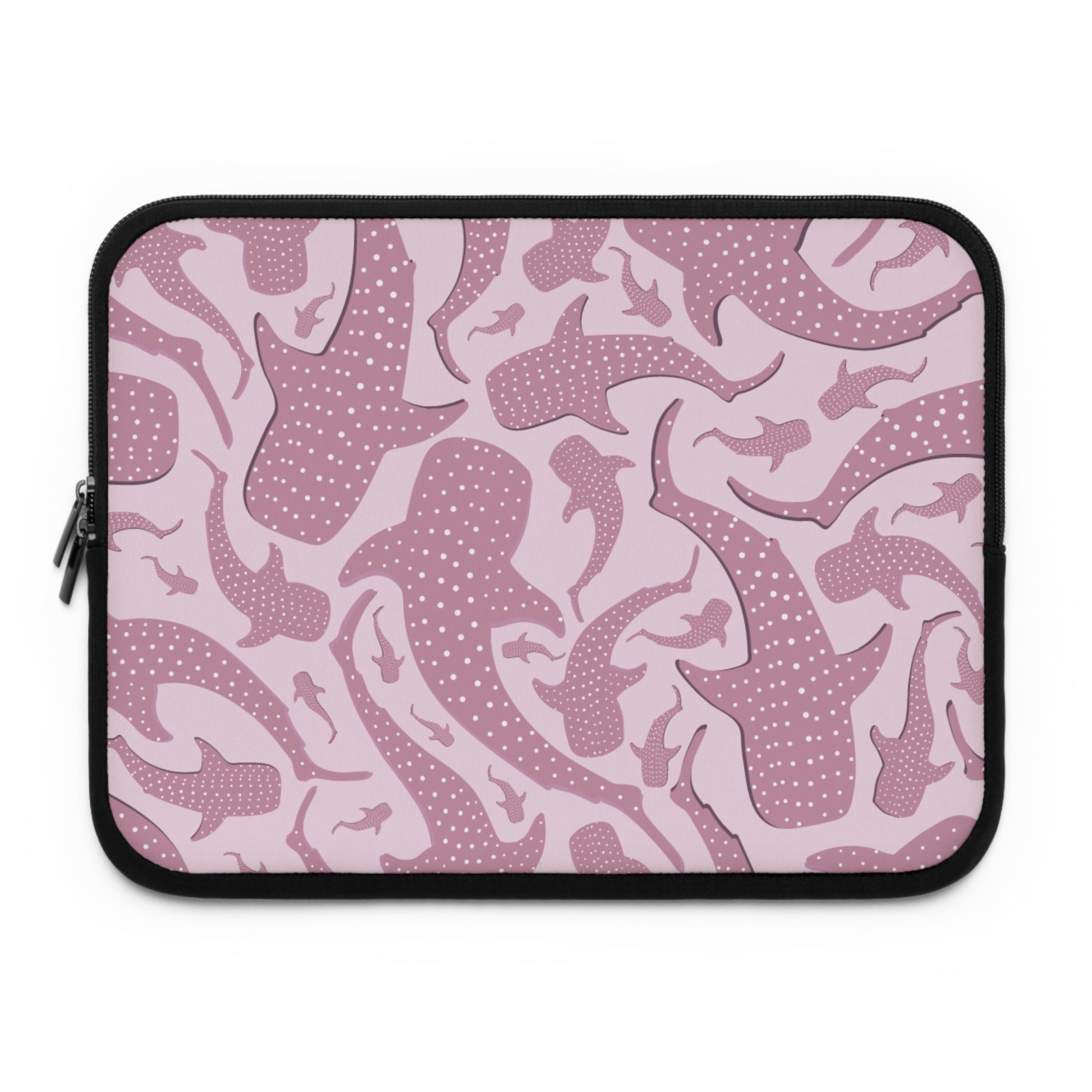 Two-tone pink whale shark design on a laptop sleeve, soft blush ground with deeper mauve sharks