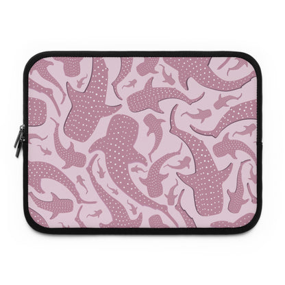 Two-tone pink whale shark design on a laptop sleeve, soft blush ground with deeper mauve sharks