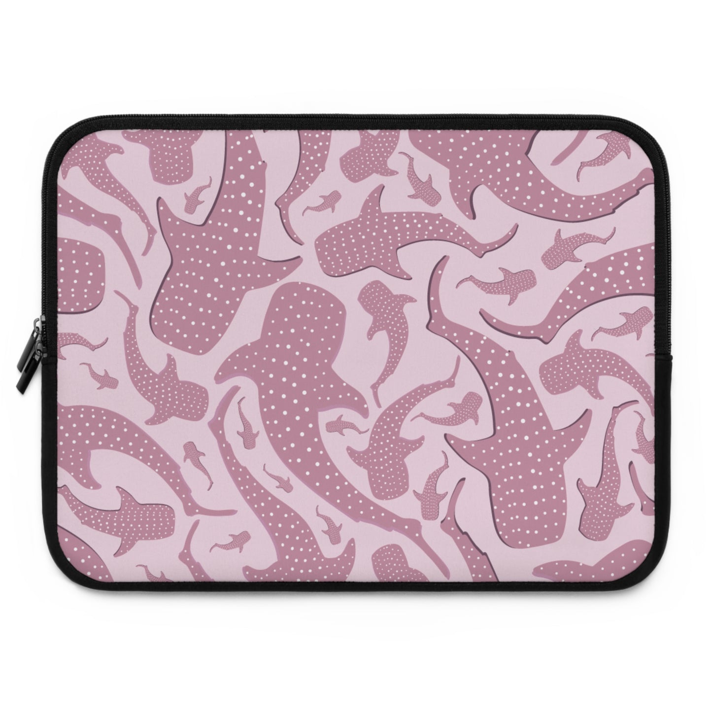 Whale shark laptop sleeve print in muted pink, large and small sharks overlapping across the panel