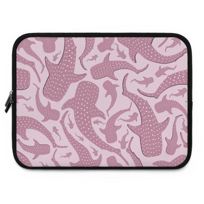 Whale shark laptop sleeve print in muted pink, large and small sharks overlapping across the panel