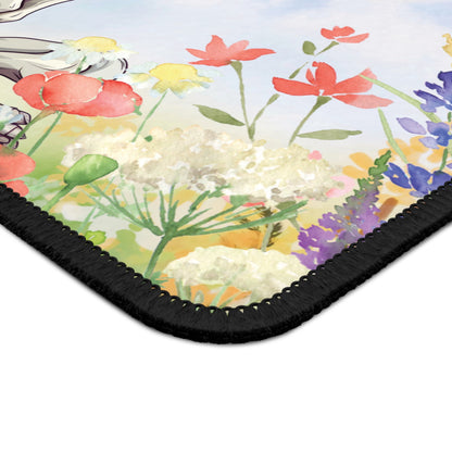 Close-up of the wildflowers and stitched edge on the Rainbow Skeleton mouse mat