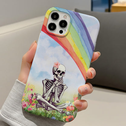 Rainbow Skeleton tough phone case held in hand